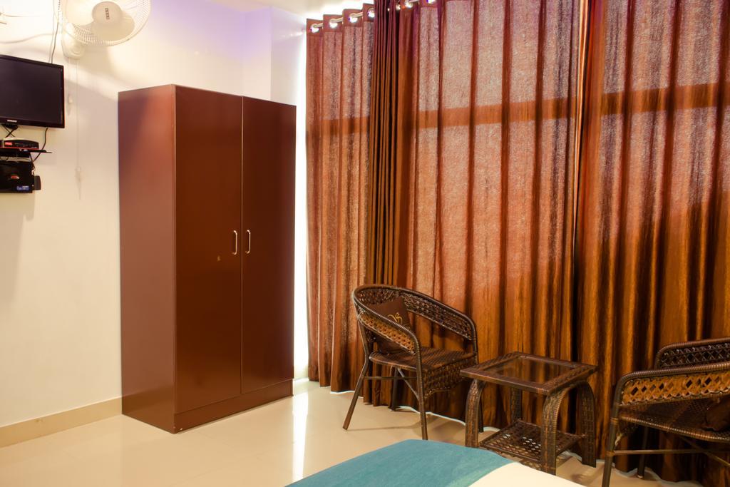 The Signature Inn Bangalore Quarto foto