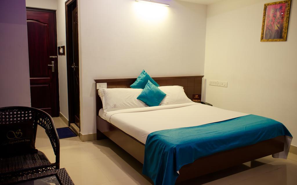 The Signature Inn Bangalore Quarto foto